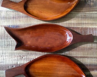 Hand Carved Wood Treys Trio of wooden platers