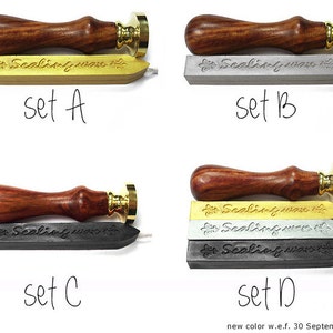 May include: Four sets of sealing wax and wooden stamp handles. Each set includes three sticks of sealing wax in gold, silver, and black. The wooden handles are a dark reddish brown color. The text "Sealing wax" is printed on the wax sticks.
