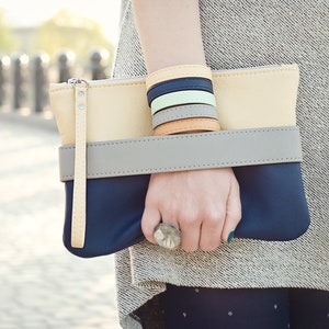 Navy clutch bag with strap top