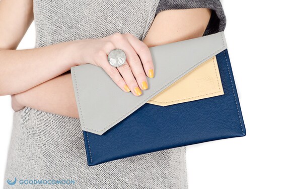 small navy clutch bag