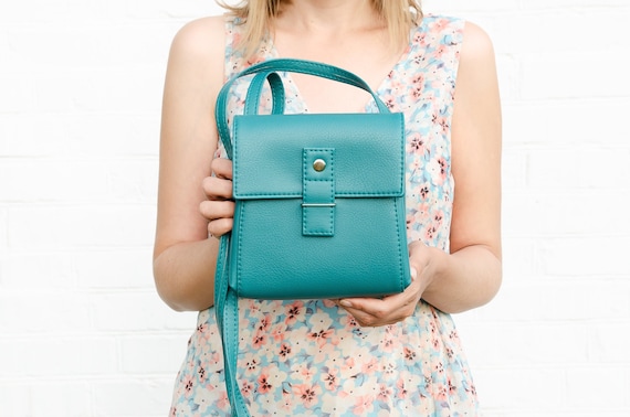 small turquoise purse