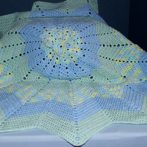 Crochet Round Ripple Baby Blanket with baby blue and mint green with variegated colors of green, blue, and yellow image 1
