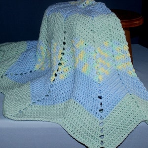 Crochet Round Ripple Baby Blanket with baby blue and mint green with variegated colors of green, blue, and yellow image 2