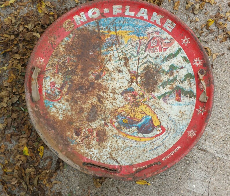 Vintage metal Snoflake round snow sled. Barton Toy Co. Etsy