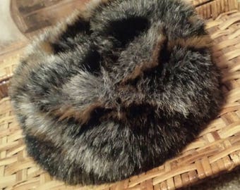 Vintage rabbit fur button hat, lined with polyester satin, elastic band. Rabbit. Warm.