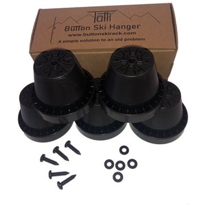 May include: Six black plastic ski button hangers with a set of screws and washers. The box reads "Button Ski Hanger" and "www.buttonskirack.com".