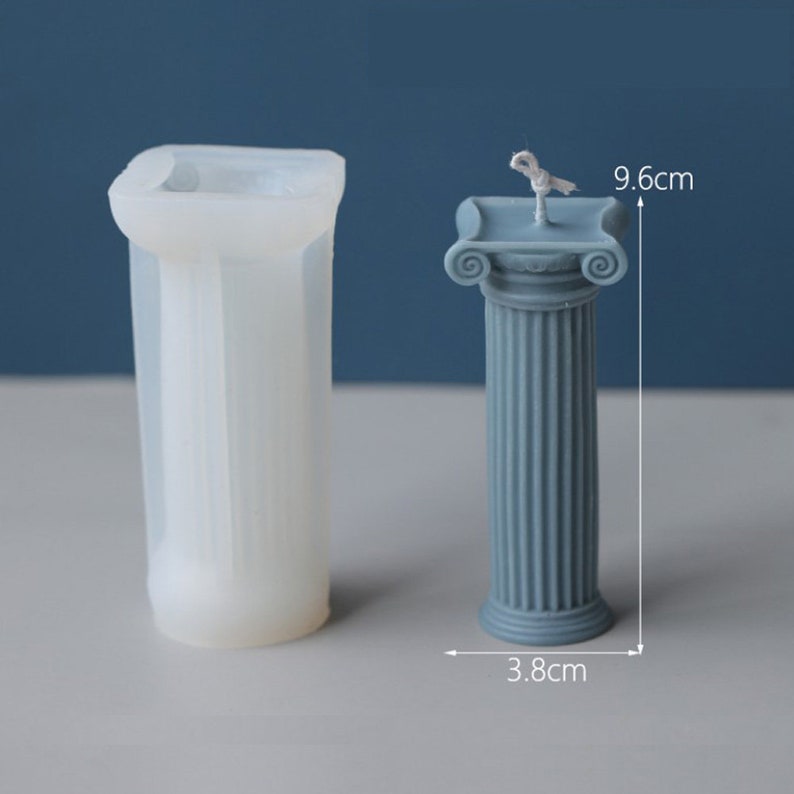 May include: A white silicone mold for making pillar candles shaped like a Roman column. The mold is 9.6 inches tall and 3.8 inches wide.