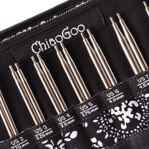 May include: A set of ChiaoGoo interchangeable knitting needles in a black zippered case. The needles are arranged in order of size, from US 2 (2.75 mm) to US 8 (5.0 mm).