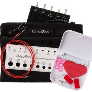 May include: A set of ChiaoGoo knitting needles and accessories in a black zippered pouch. The set includes a ruler, a red cable, and a small white case with a heart-shaped red pad, pink stitch markers, and needles.