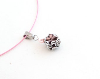 Necklace or necklace in an upcycling look made from coffee capsules in old pink Rosabaya variety