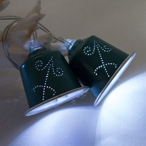Lichterkette aus Kaffeekapseln mit dem Sternzeichen Schütze als Motiv in grün