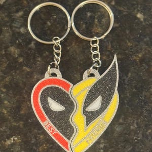 3d printed Wolverine and Deadpool Friendship keychains