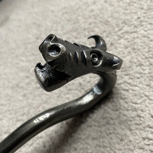 Dragons head fire poker + bottle opener