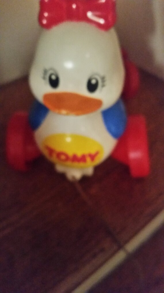 tomy duck pull toy