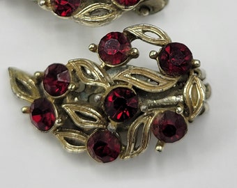 signed LISNER Vintage gold tone ornate clip on earrings, Red Stone