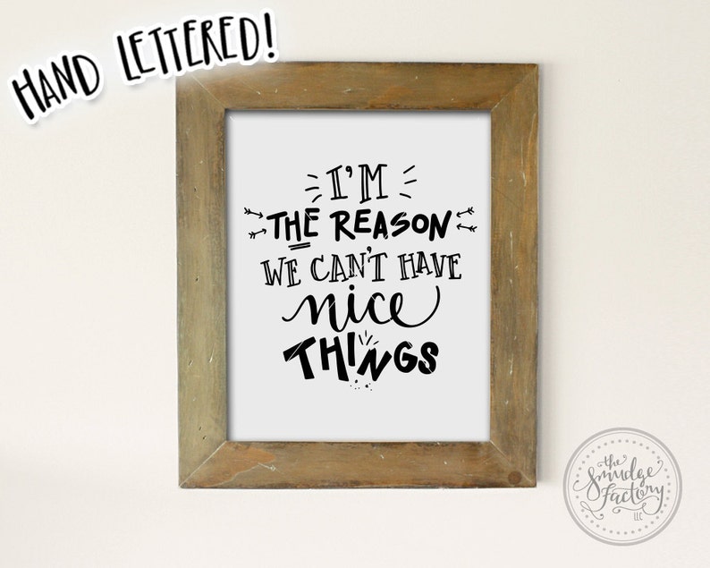 May include: A framed print with a white background and black text that reads "I'm the reason we can't have nice things". The frame is made of wood and has a rustic finish.