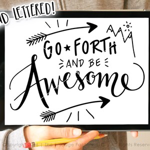 May include: Black and white hand-lettered design on a white background. The design features the text "GO FORTH AND BE AWESOME" with arrows and mountain illustrations.