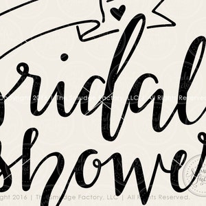 May include: Black and white calligraphy text that reads "bridal shower" with a small heart above the word "bridal".