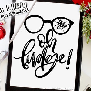 May include: Black and white digital design featuring a pair of glasses with one lens cracked and the text "oh fudge!" in a handwritten font.