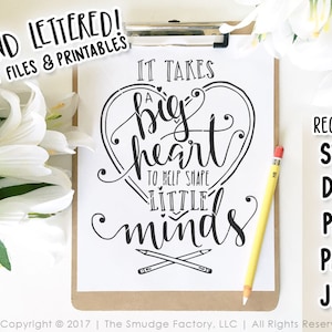 May include: A black and white printable design with the text "It takes a big heart to help shape little minds". The text is in a heart shape with two pencils crossed underneath. The design is on a white sheet of paper with a brown clipboard.