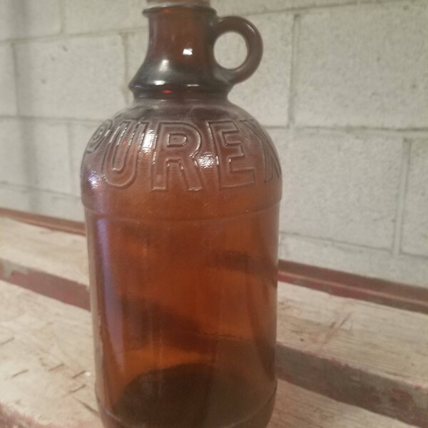 Vintage Amber glass jug or bottle, 1/2 gallon thumb loop bottle or jug, embossed lettering,purex bleach bottle,64 oz