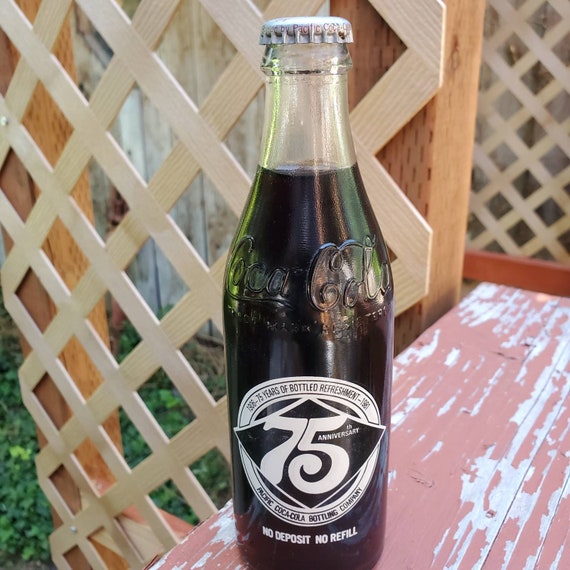Coca Cola 75th Anniversary Commemorative 1900 to1975 Coke Bottle Melted Flat for Display Spoon Rest Coca Cola 75th Anniversary Commemorative 1900 to1975 Coke Bottle Melted Flat for Display Spoon Rest