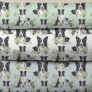 May include: Three stacks of fabric with a repeating pattern of Border Collie dogs and small white flowers. The top stack is mint green, the middle is white, and the bottom is blue. The text "Mockup view" and other text is visible at the top.