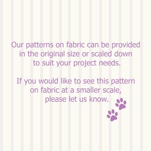 May include: A light purple background with vertical white stripes. Text in a darker purple states that patterns on fabric can be provided in the original size or scaled down. Two purple paw prints are at the bottom.