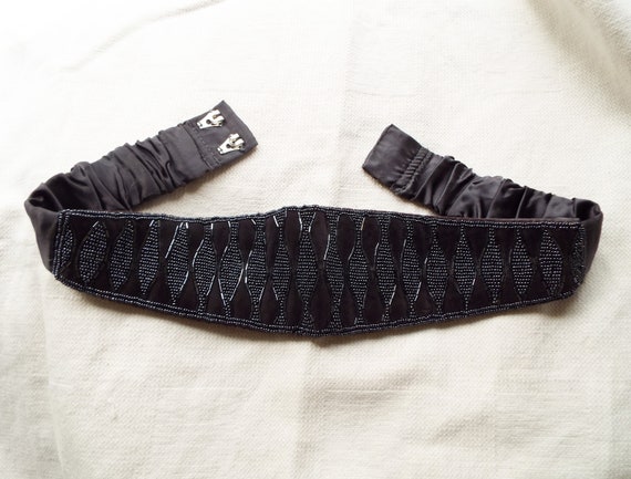 Unworn dark grey satin and velvet glass beaded bel