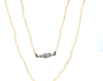 An Edwardian Natural Pearl Certified Necklace