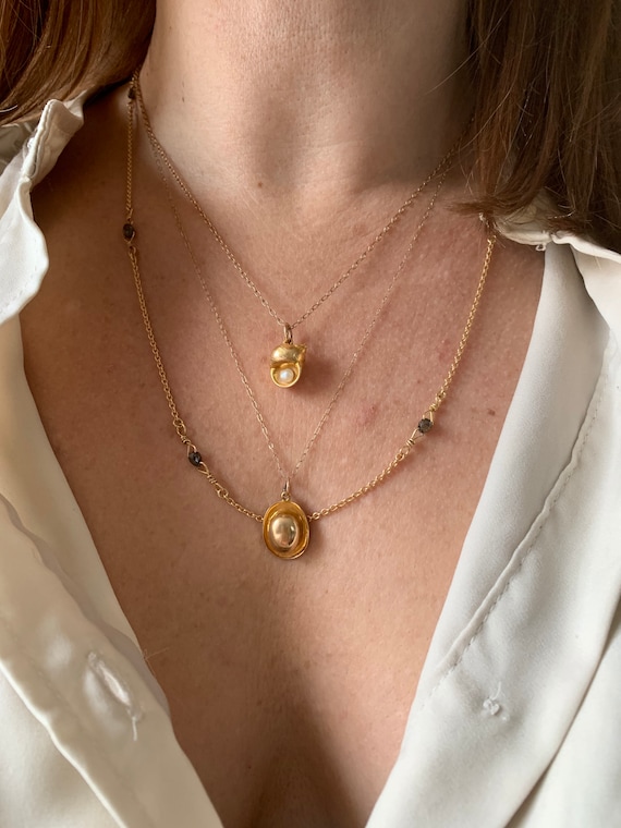 An 18k Gold Diamond Beaded Necklace