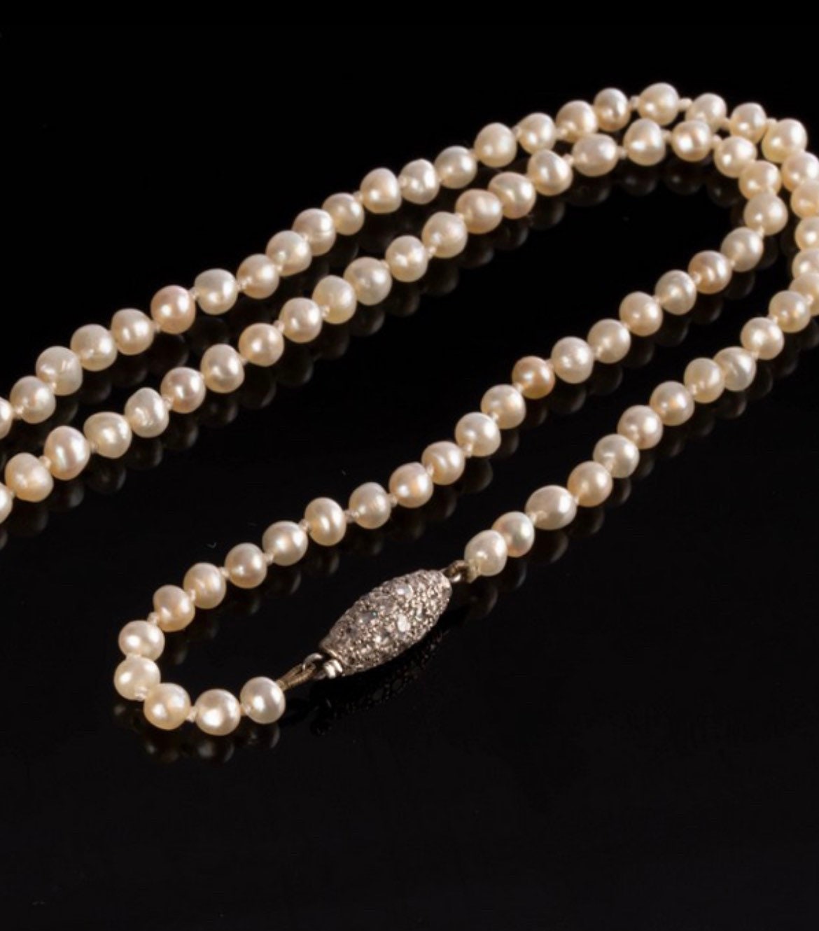 A Natural Saltwater Pearl Necklace and 