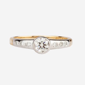 A 18k Gold Diamond Ring