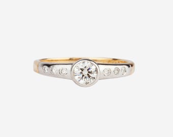 A 18k Gold Diamond Ring