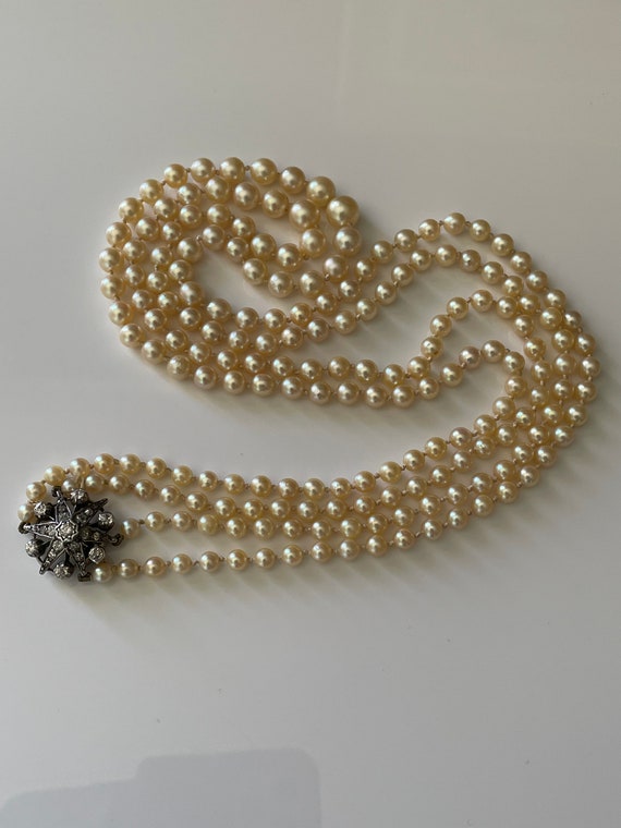 Pearl necklace with diamond clasp sale