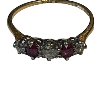A 1940s Ruby and Old Cut Diamond 18 Karat Gold Five Stone Ring