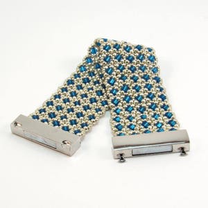 May include: A blue and silver beaded bracelet with a silver clasp.