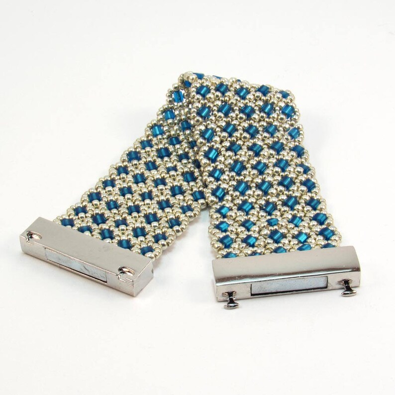 May include: A blue and silver beaded bracelet with a silver clasp.