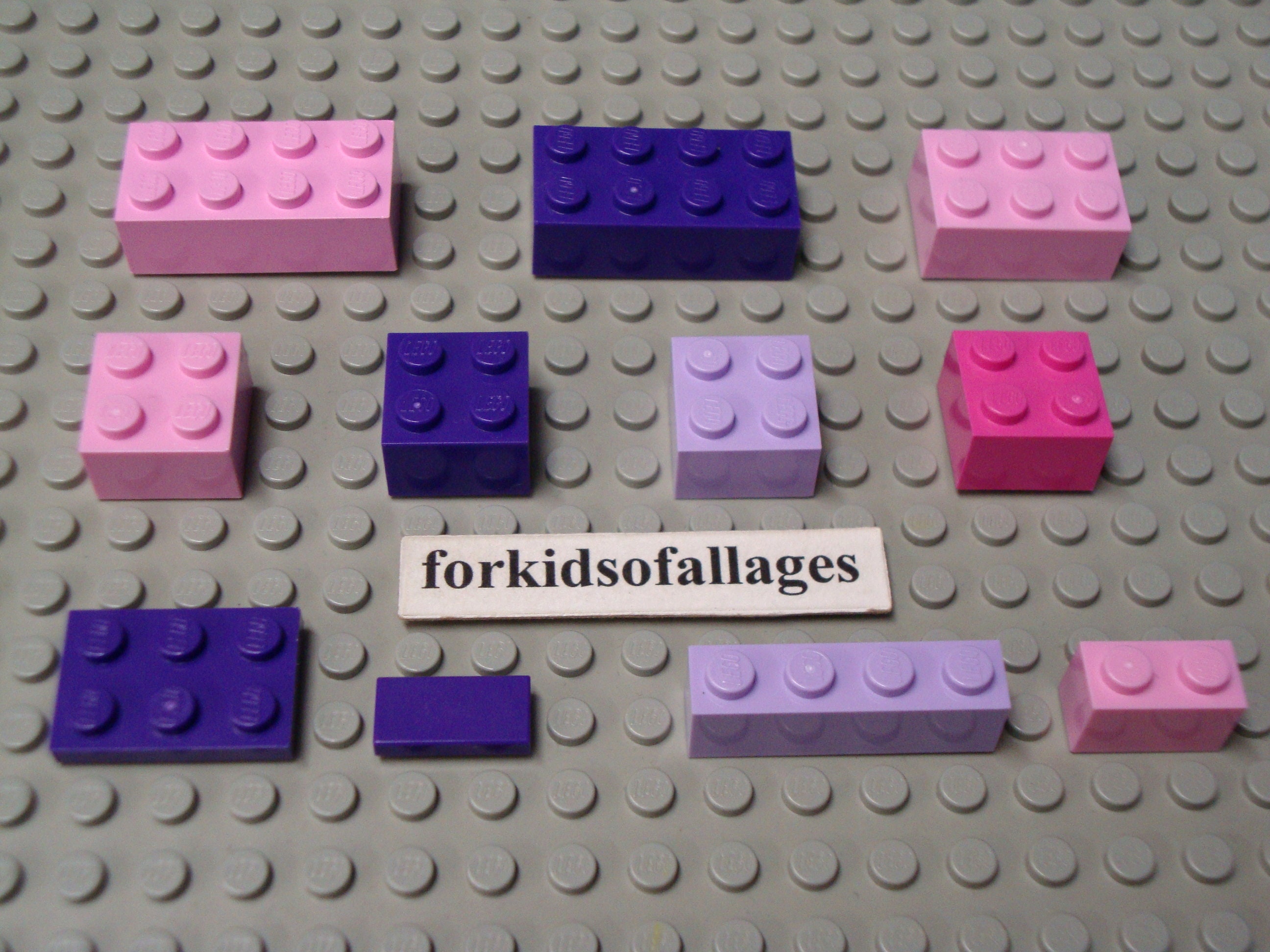 LEGO Piezas y piezas: 20 ladrillos rosa oscuro (morado brillante) 1x4