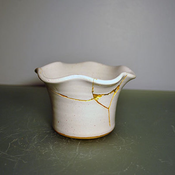 Misty beige stone 4" cup/bowl mended with several gold seams - Kintsugi / Kintsukuroi Art
