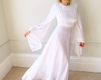 Villanelle dress. Killing Eve dress. Ivory Hand-fasting Dress. 1970s Wedding Dress. Festival Wedding dress. Incredible sleeves