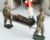 Vintage Britains Toy Soldiers Wounded Soldier on a stretcher, Nurse and 2 attendents Trench Warfare
