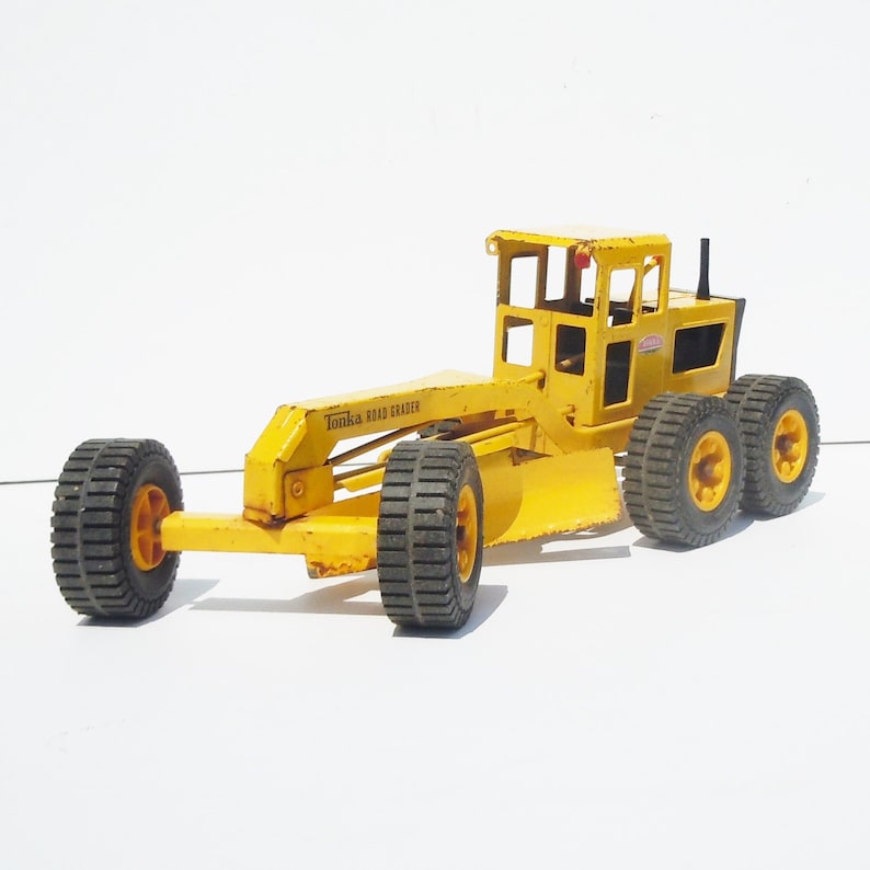 Tonka Truck Classic Road Grater Original Played with Condition Works well Blade and Wheels Pivot