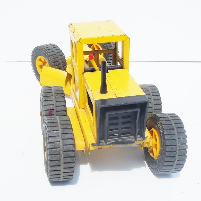 Tonka Truck Classic Road Grater Original Played with Condition Works well Blade and Wheels Pivot
