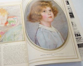 May include: A pastel portrait of a young girl with light brown hair and a light blue dress. The portrait is framed in a gold oval and has the artist's signature in the bottom left corner.