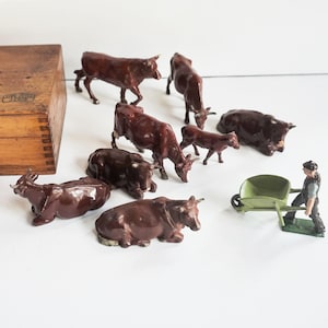 Cows / 8 Brown Cattle and their keeper / Tiny Toy Farm Figures from a Toy Soldier Company /  Britains&#39; Ltd London