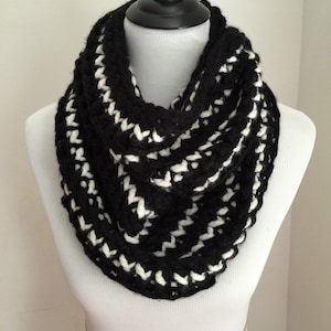 Black/white knitted infinity scarf. A perfect winter accessory.