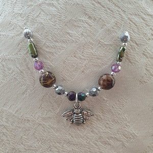 Bee necklace charity on sale