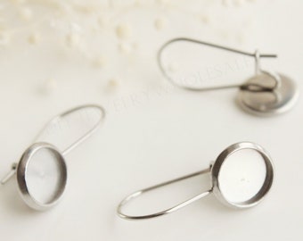 Può includere: Tre basi per orecchini in argento con cabochon rotondi in vetro. DIY gioielli all'ingrosso forniture di gioielli.