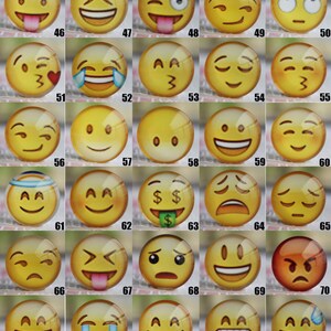 May include: Eighty yellow glass cabochons with different emoji faces. Each cabochon is approximately 1 inch in diameter.